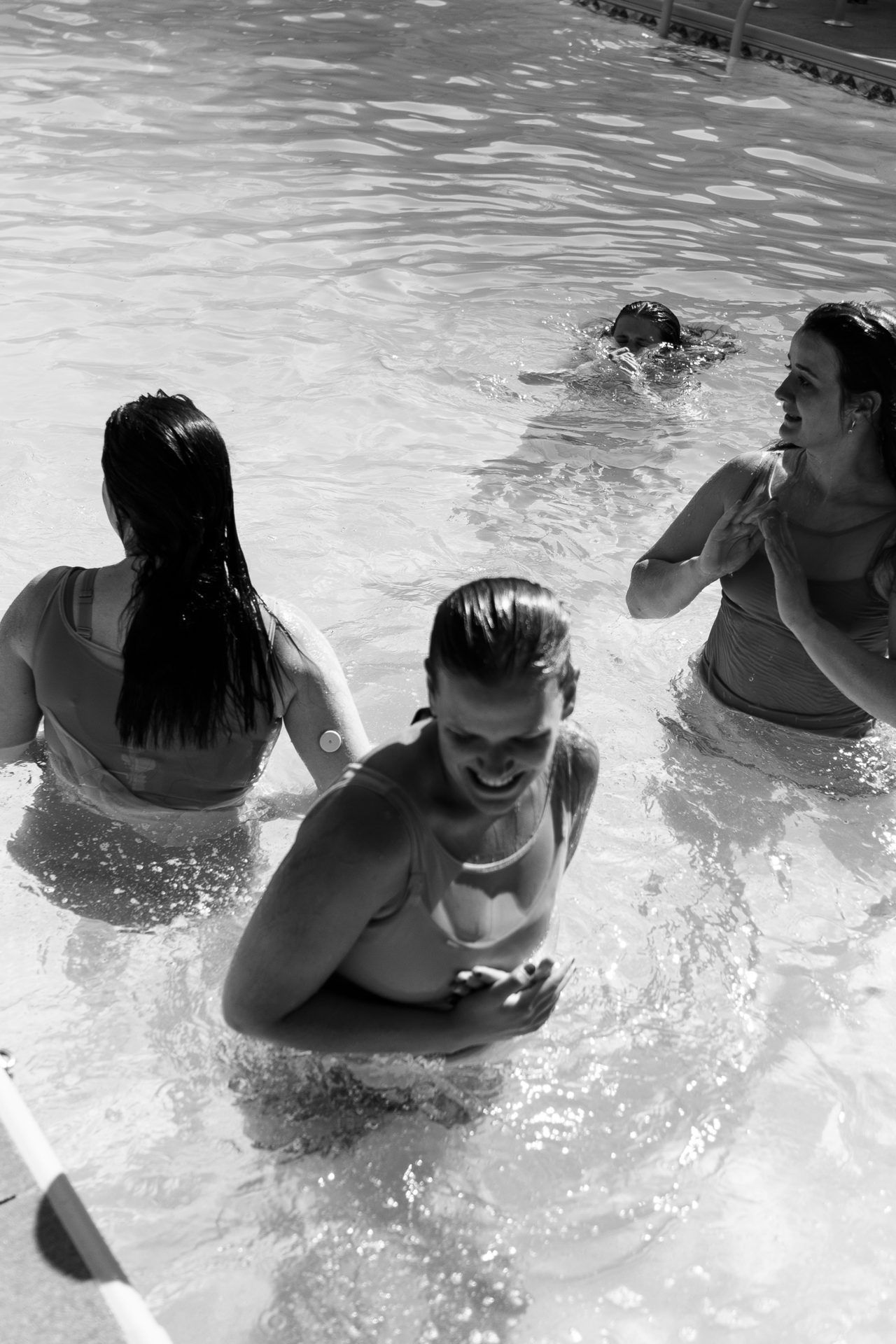 Body of water, Photograph, Smile, White, Black, Swimwear, Happy, Black-and-white, Mammal