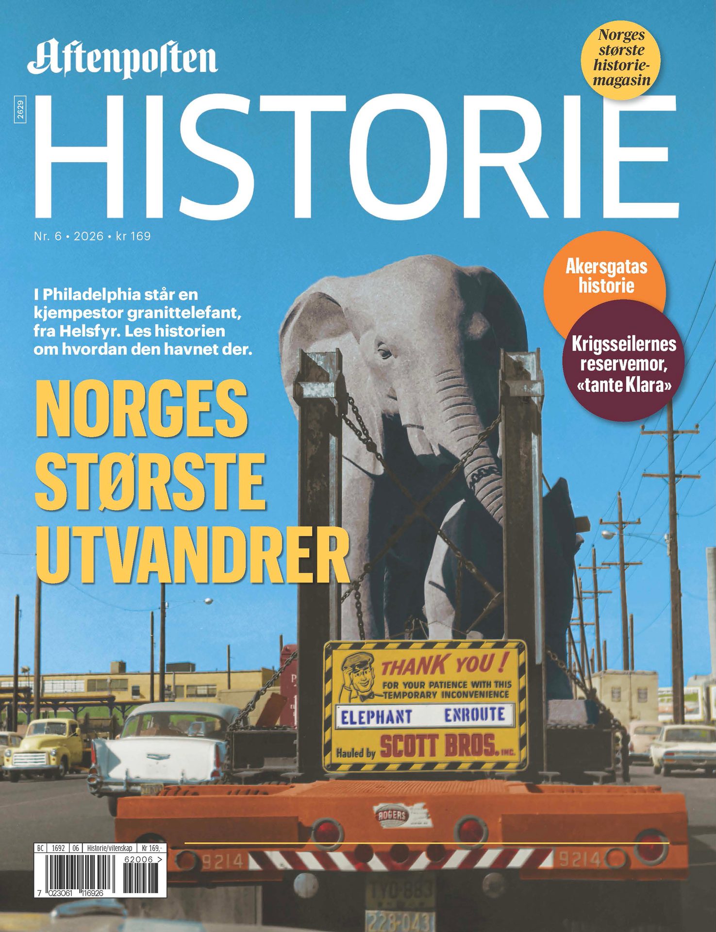 A magazine cover with a large granite elephant on a truck and 'Aftenposten Historie' title.