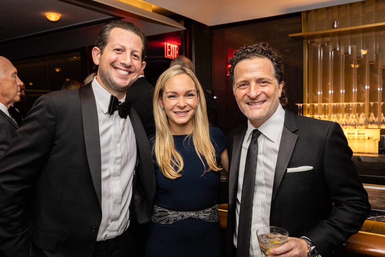 Social group, Smile, Coat, Tie, Tableware, Suit