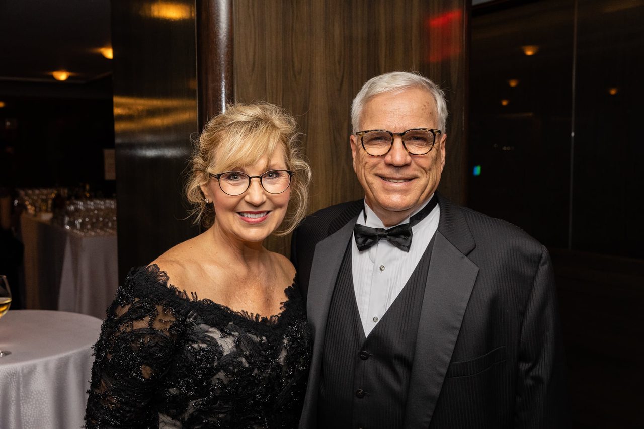 Vision care, Bow tie, Glasses, Smile, Coat, Tableware, Happy, Suit