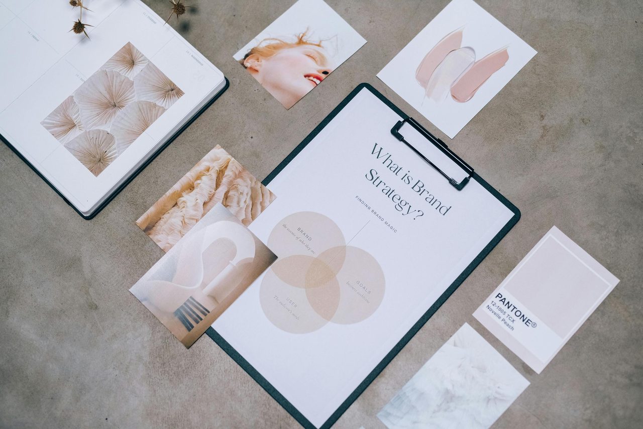 Flat lay showing branding materials and design concepts for creative strategy discussions.. Leeloo The First: https://www.pexels.com/@leeloothefirst