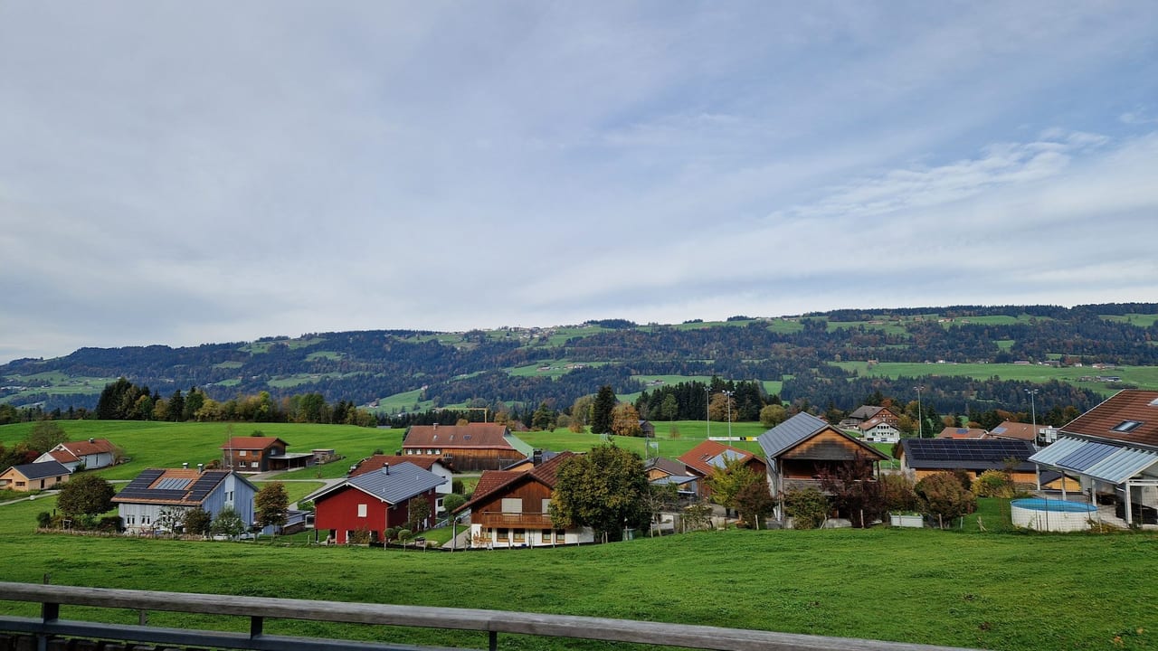 Natural landscape, Land lot, Cloud, Sky, Plant, Ecoregion, House, Highland, Mountain, Neighbourhood