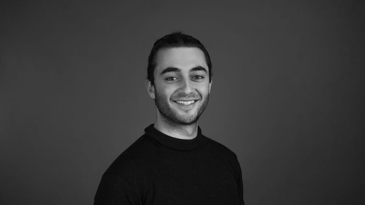 Forehead, Smile, Nose, Cheek, Chin, Arm, Eyebrow, Shirt, Beard, Human