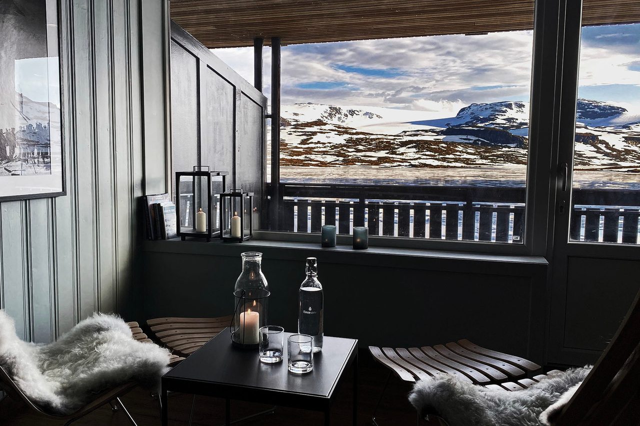 Interior design, Cloud, Building, Table, Furniture, Property, Window, Sky, Bottle, Tableware
