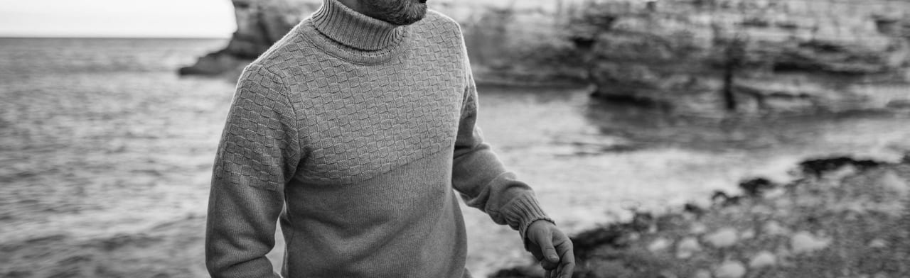 Facial expression, Human body, Hand, Outerwear, Water, Photograph, White, Black, Sleeve, Black-and-white