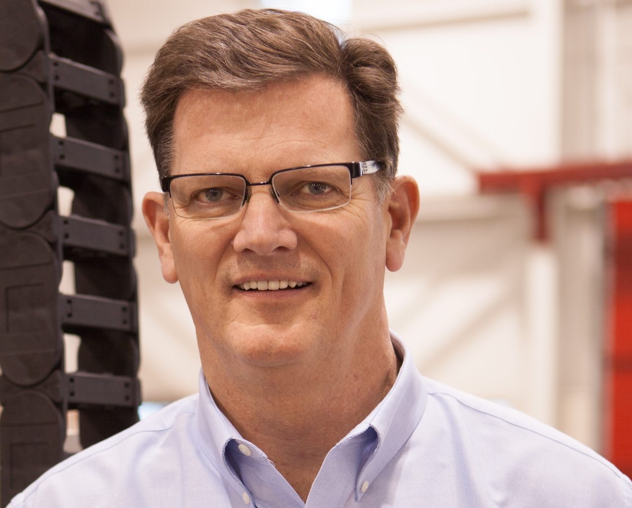 Vision care, Dress shirt, Forehead, Glasses, Hair, Chin, Smile, Hairstyle, Eyebrow, Eye