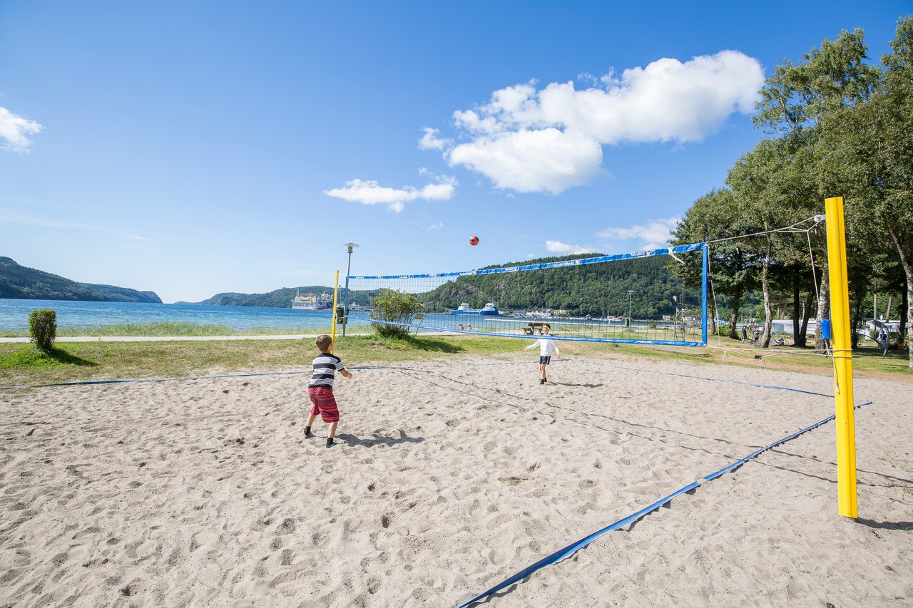 People on beach, Volleyball net, Cloud, Sky, Water
