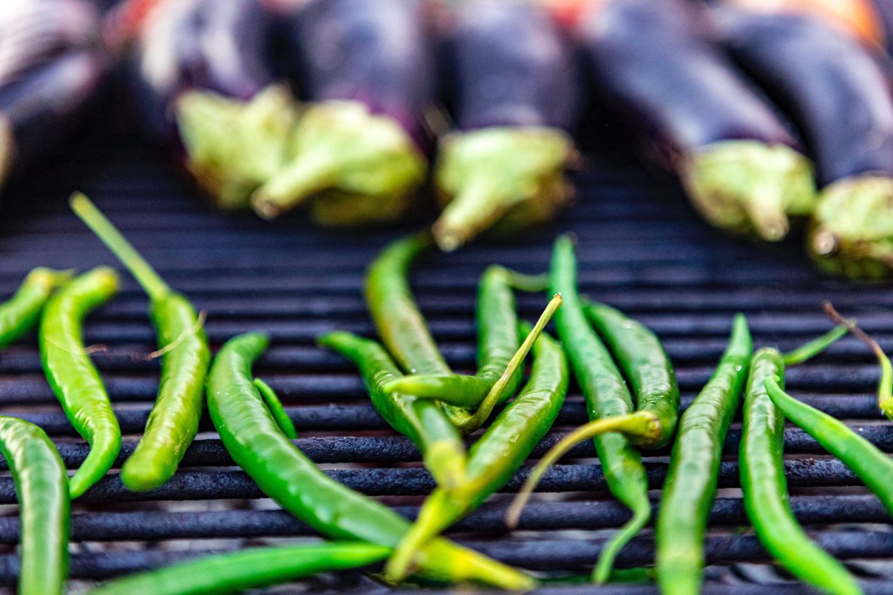 Natural foods, Staple food, Chili pepper, Public space, Plant, Green, Ingredient, Spice, Cuisine