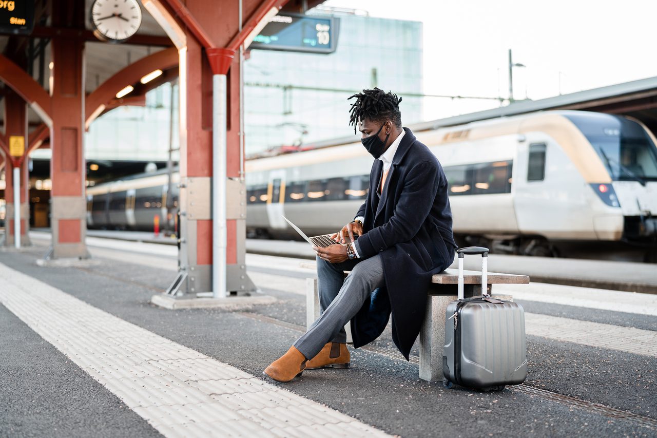 Mode of transport, Luggage and bags, Street fashion, Rolling stock, Train, Photograph, White, Vehicle, Travel, Railway