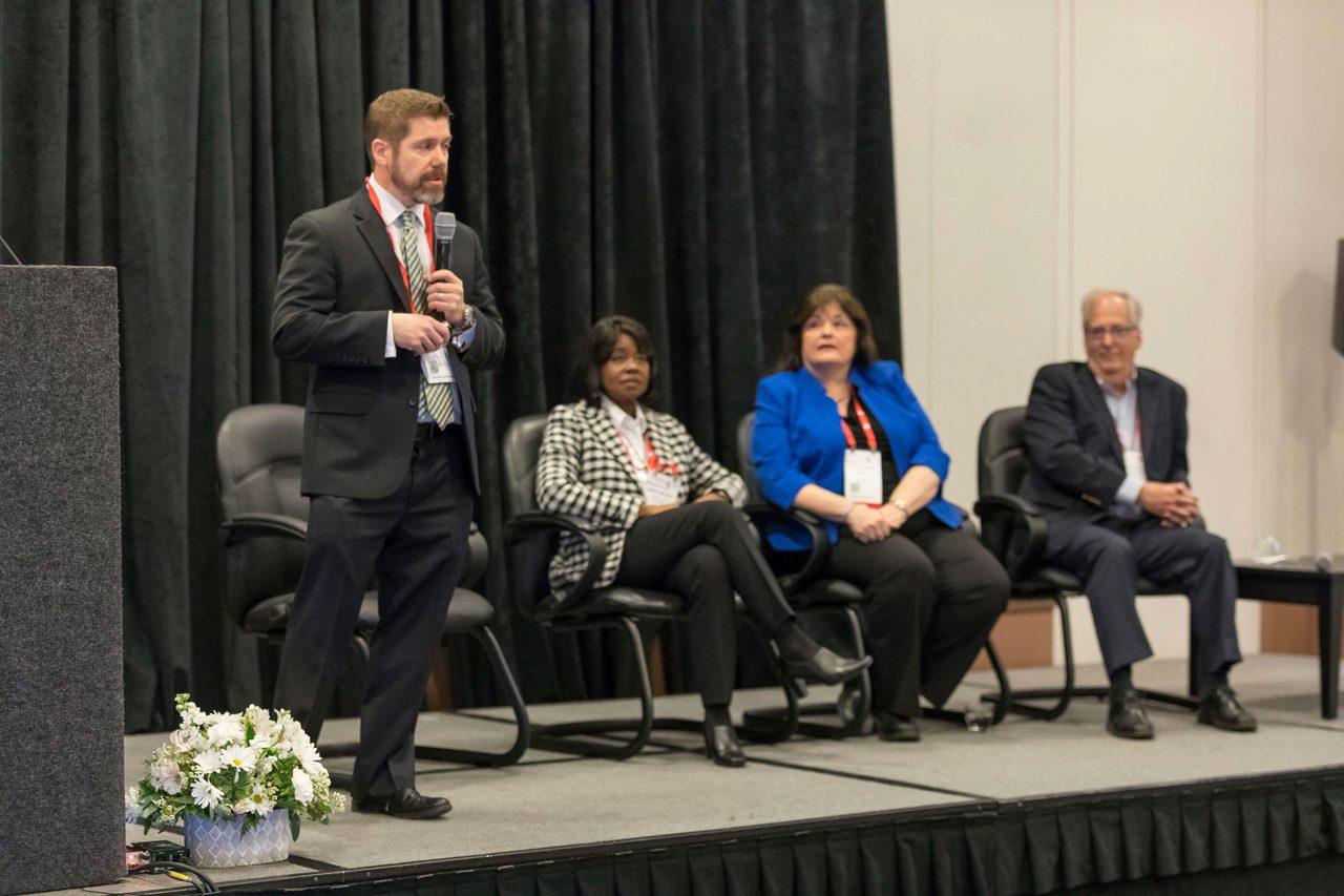 Trousers, Plant, Coat, Chair, Curtain, Interaction, Spokesperson, Suit
