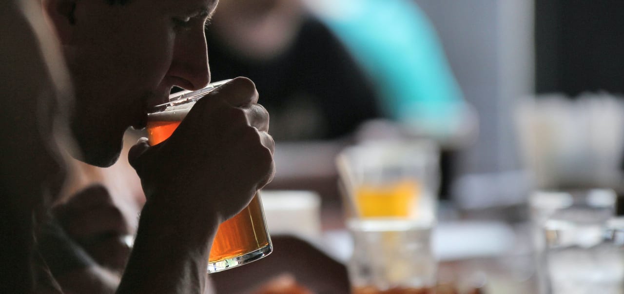 Man drinking a beer from