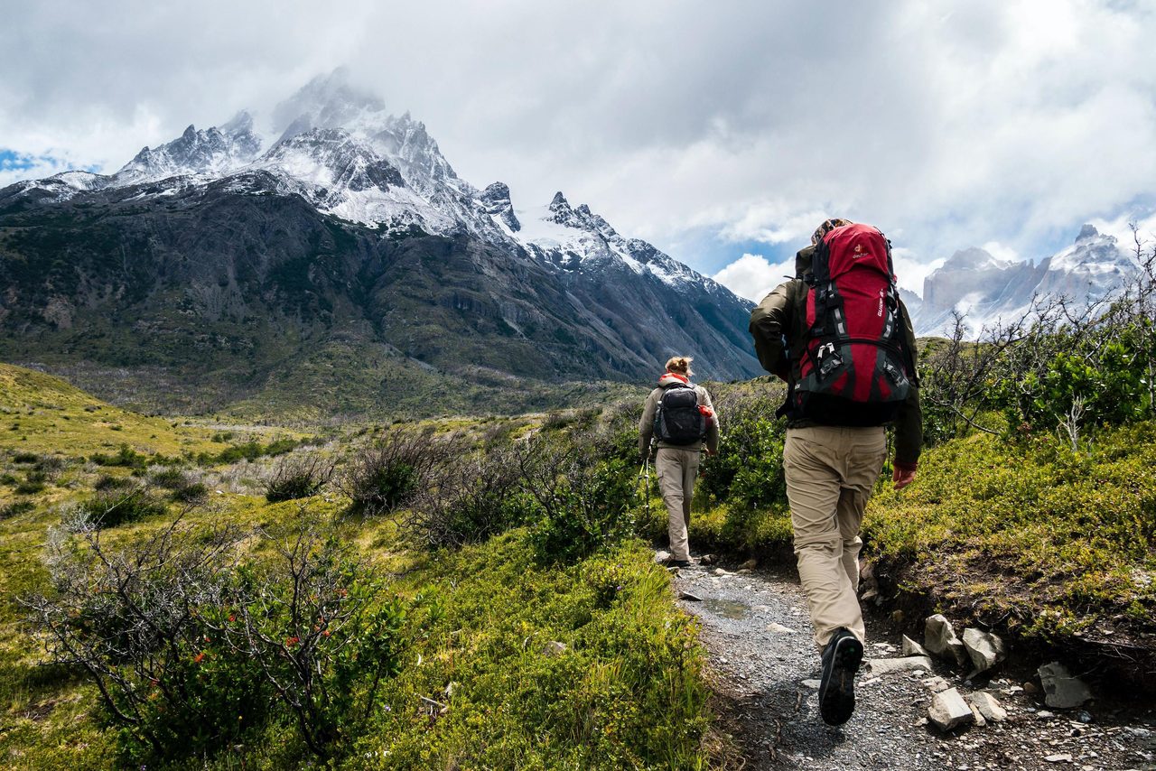 People in nature, Luggage and bags, Natural landscape, Outdoor recreation, Hiking equipment, Cloud, Plant, Sky, Mountain