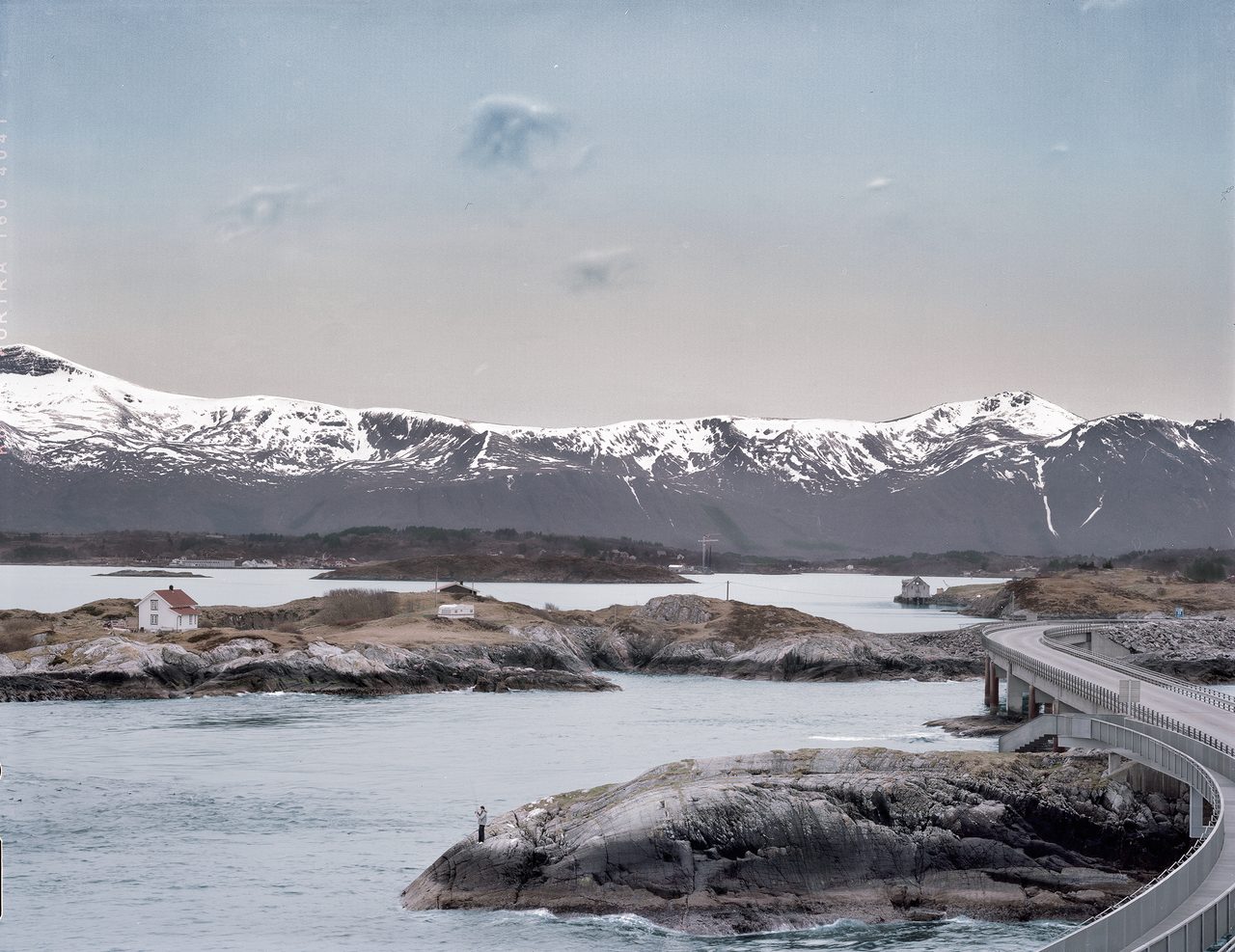 Coastal and oceanic landforms, Body of water, Natural landscape, Sky, Cloud, Mountain, Snow, Ecoregion, Highland