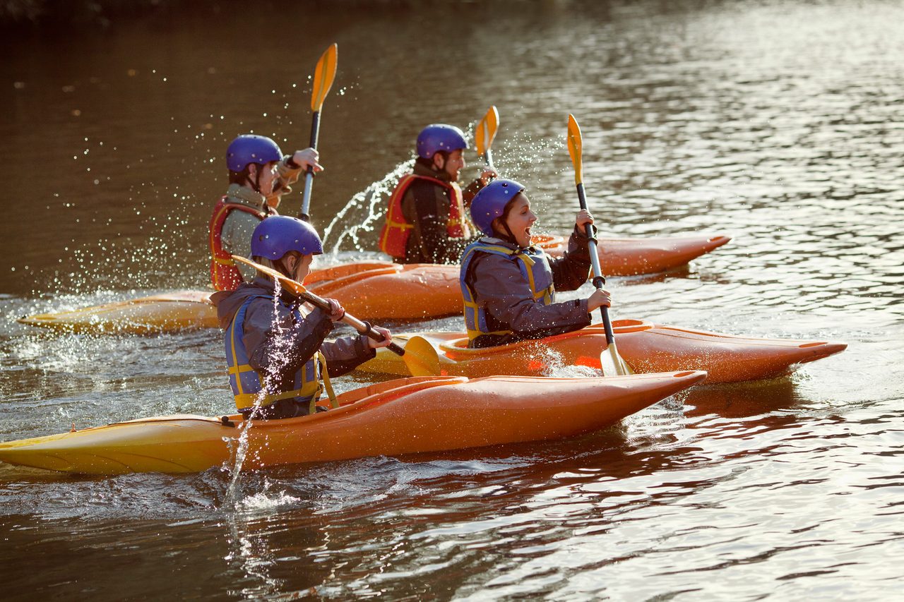Sports equipment, Water, Boat, Paddle, Vehicle, Helmet, Lake, Lifejacket
