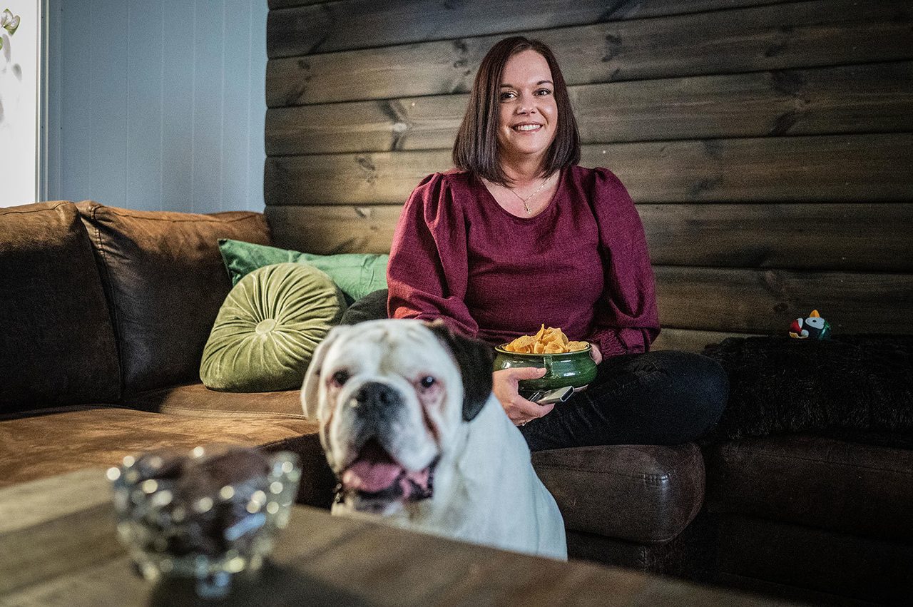Flash photography, Dog breed, Smile, Couch, Comfort, Bulldog, Carnivore, Fawn
