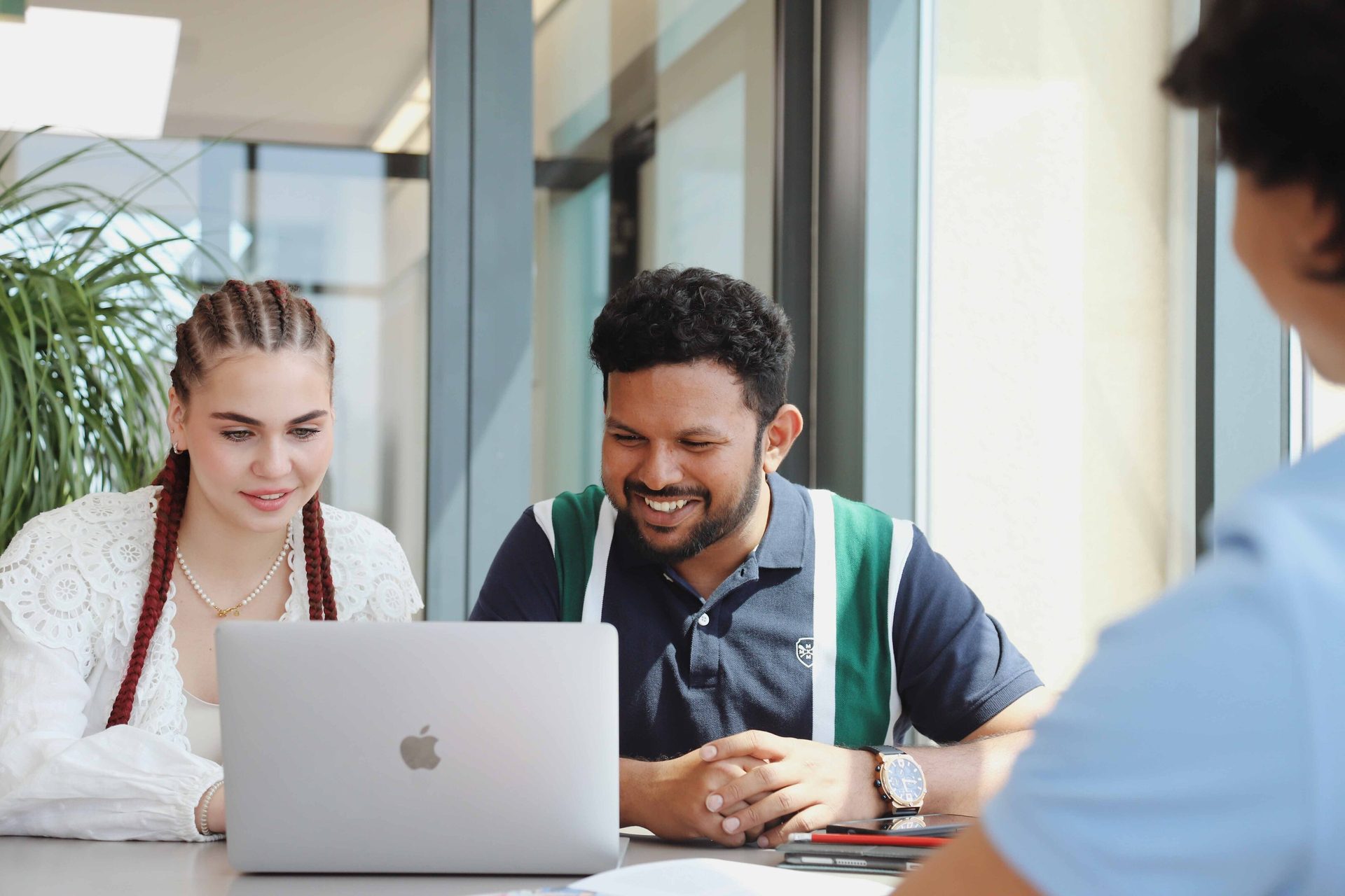 Personal computer, Social group, Smile, Laptop, Plant, Table, Houseplant