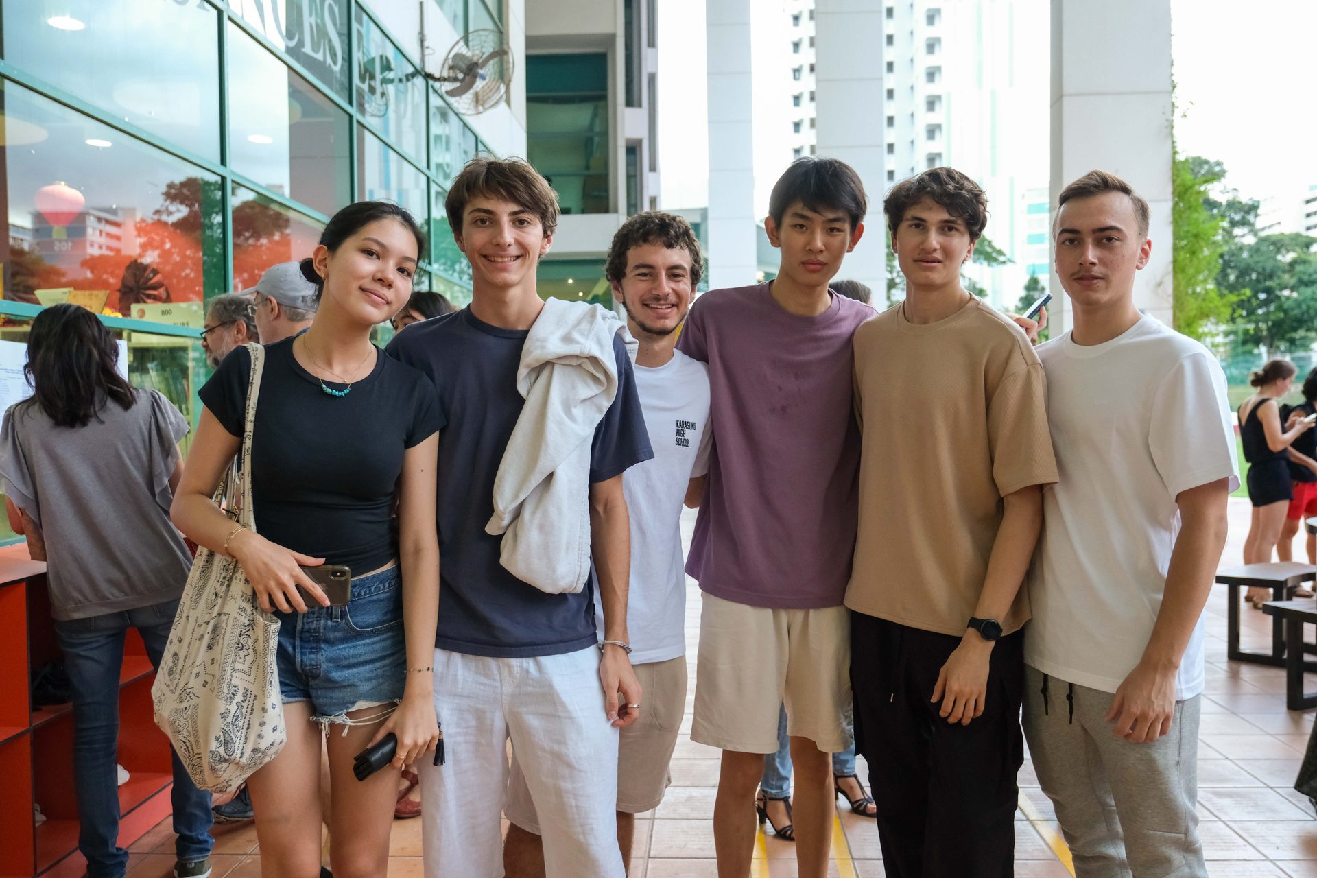 Luggage & bags, Social group, Smile, Shorts, Youth, Happiness, Leisure, Fun, Waist