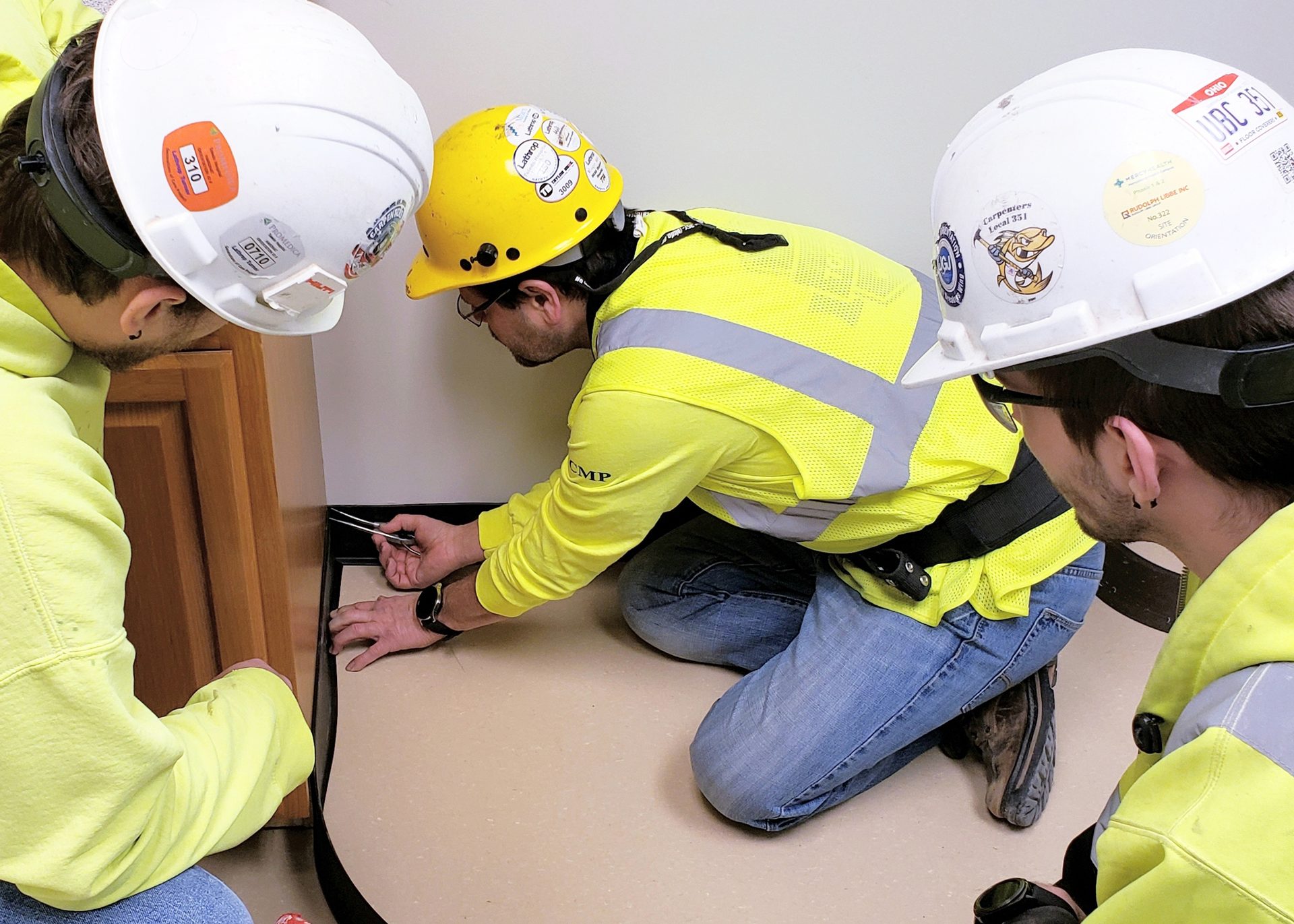 Hard hat, Workwear, Helmet, Engineer, Sleeve, Yellow, Tradesman, Sunglasses, Headgear