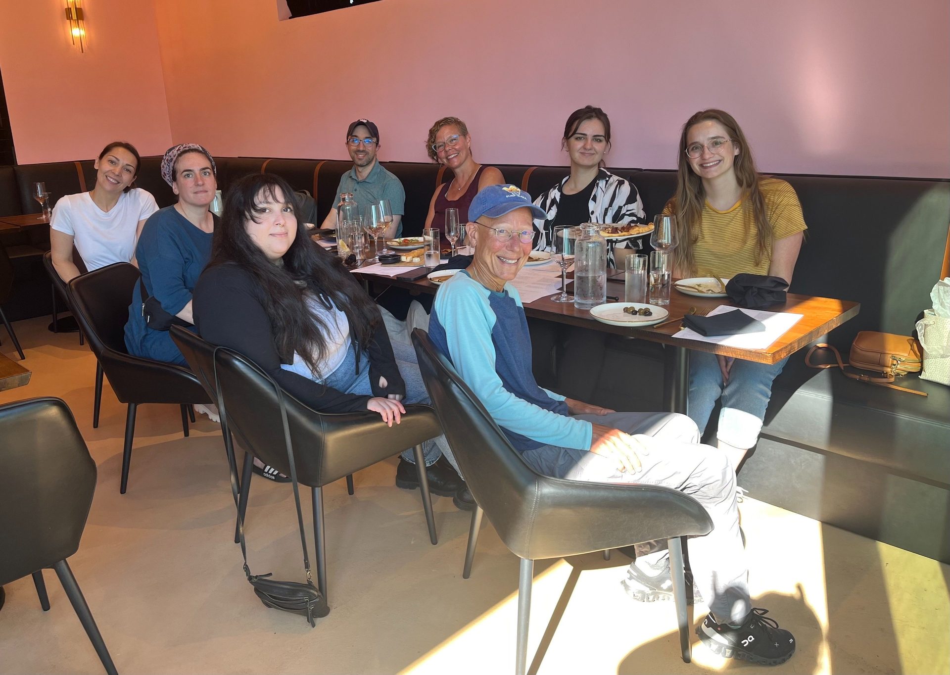 Interior design, Furniture, Smile, Table, Chair, Sitting, Sharing, Drinkware, Desk