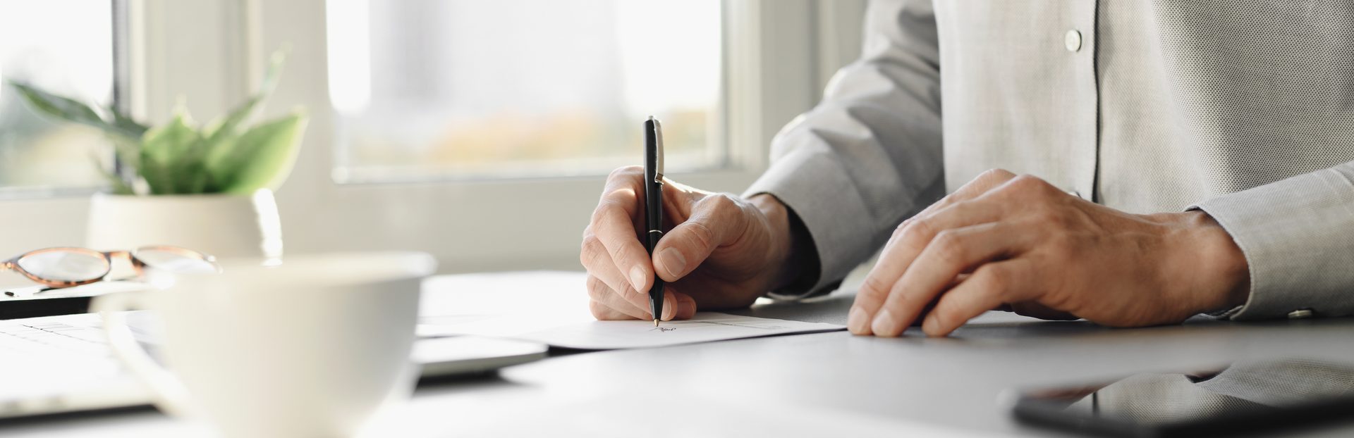 Writing instrument accessory, Office supplies, Automotive design, Hand, Table, Gesture, Finger, Handwriting