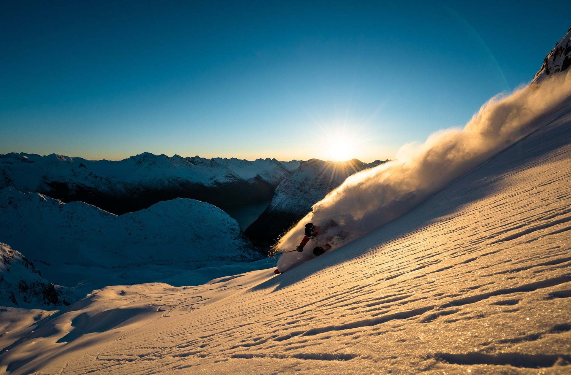 Natural landscape, Atmospheric phenomenon, Sky, Atmosphere, Snow, Mountain, Slope, Highland, Cloud, Terrain