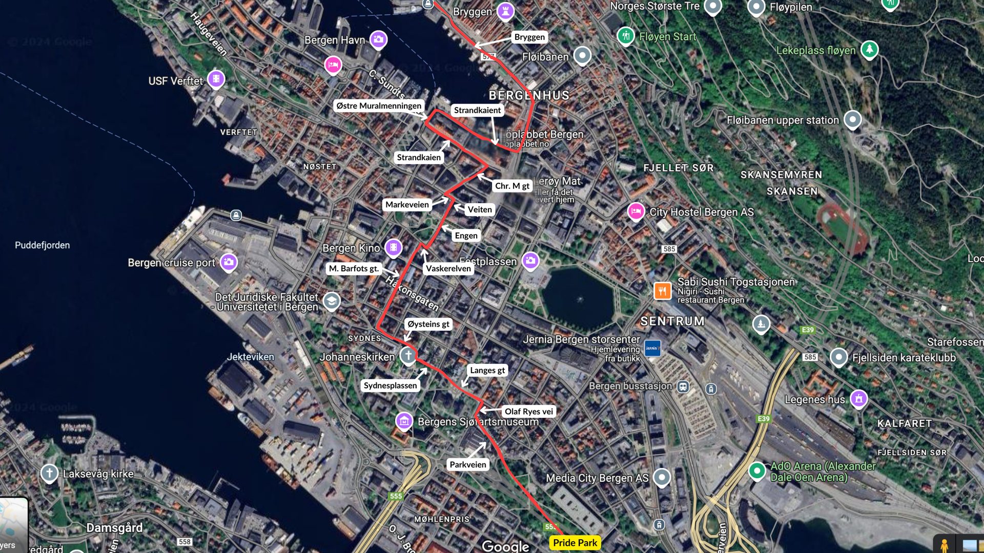 Satellite map of Bergen, Norway, showing a highlighted walking route through the city center from Bryggen to Pride Park.