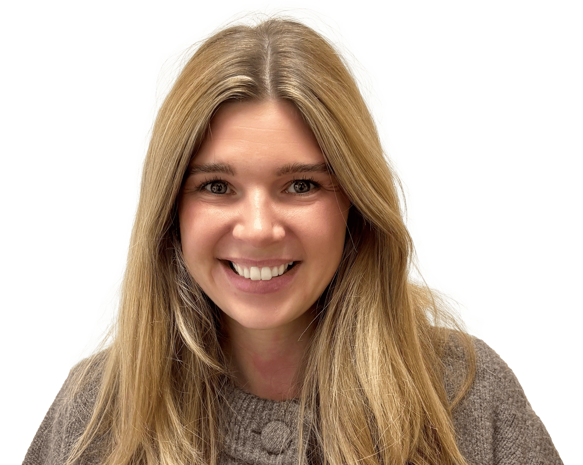 A smiling woman with long blonde hair, wearing a grey sweater.