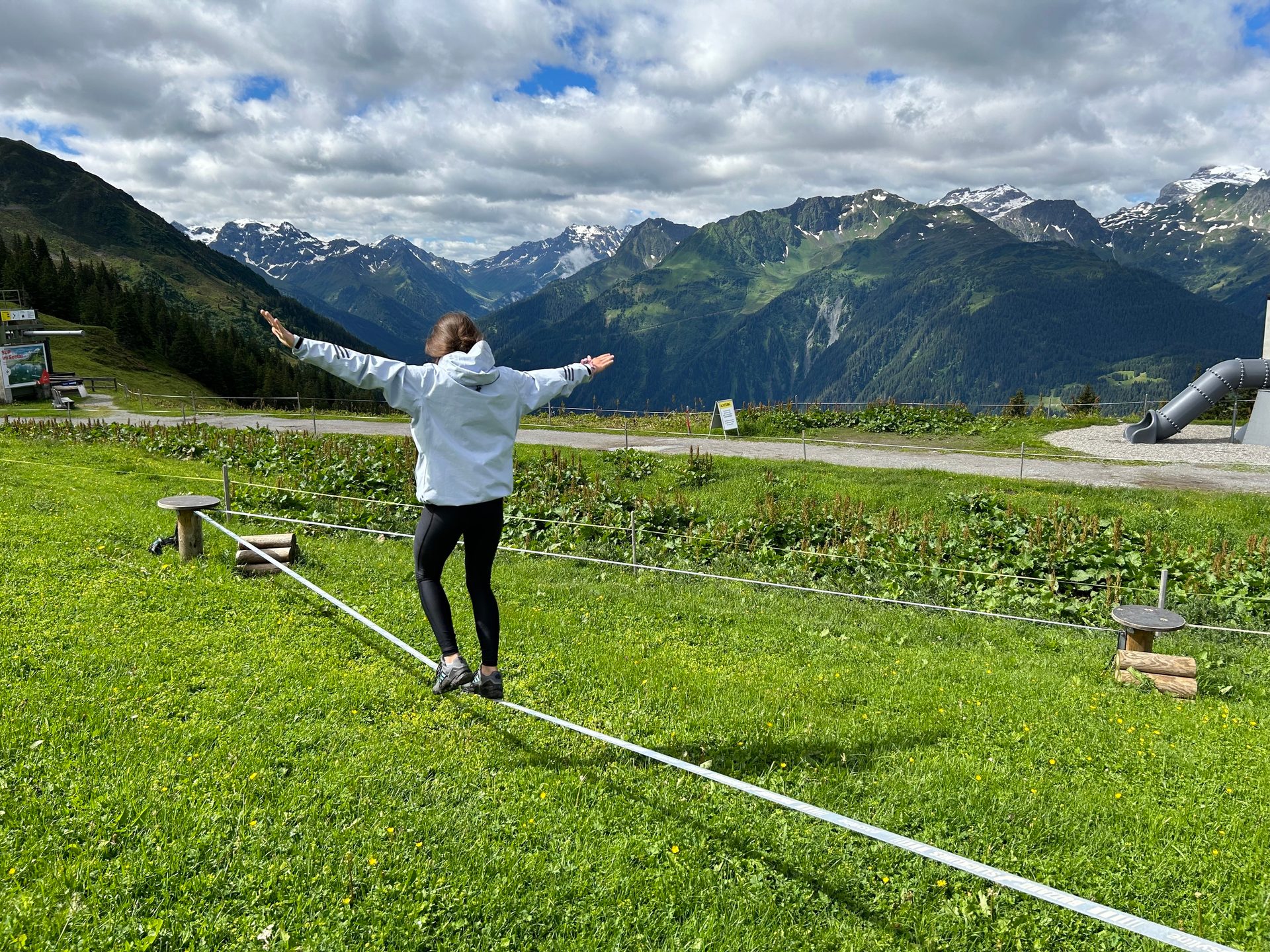 People in nature, Natural environment, Land lot, Cloud, Sky, Mountain, Plant, Highland