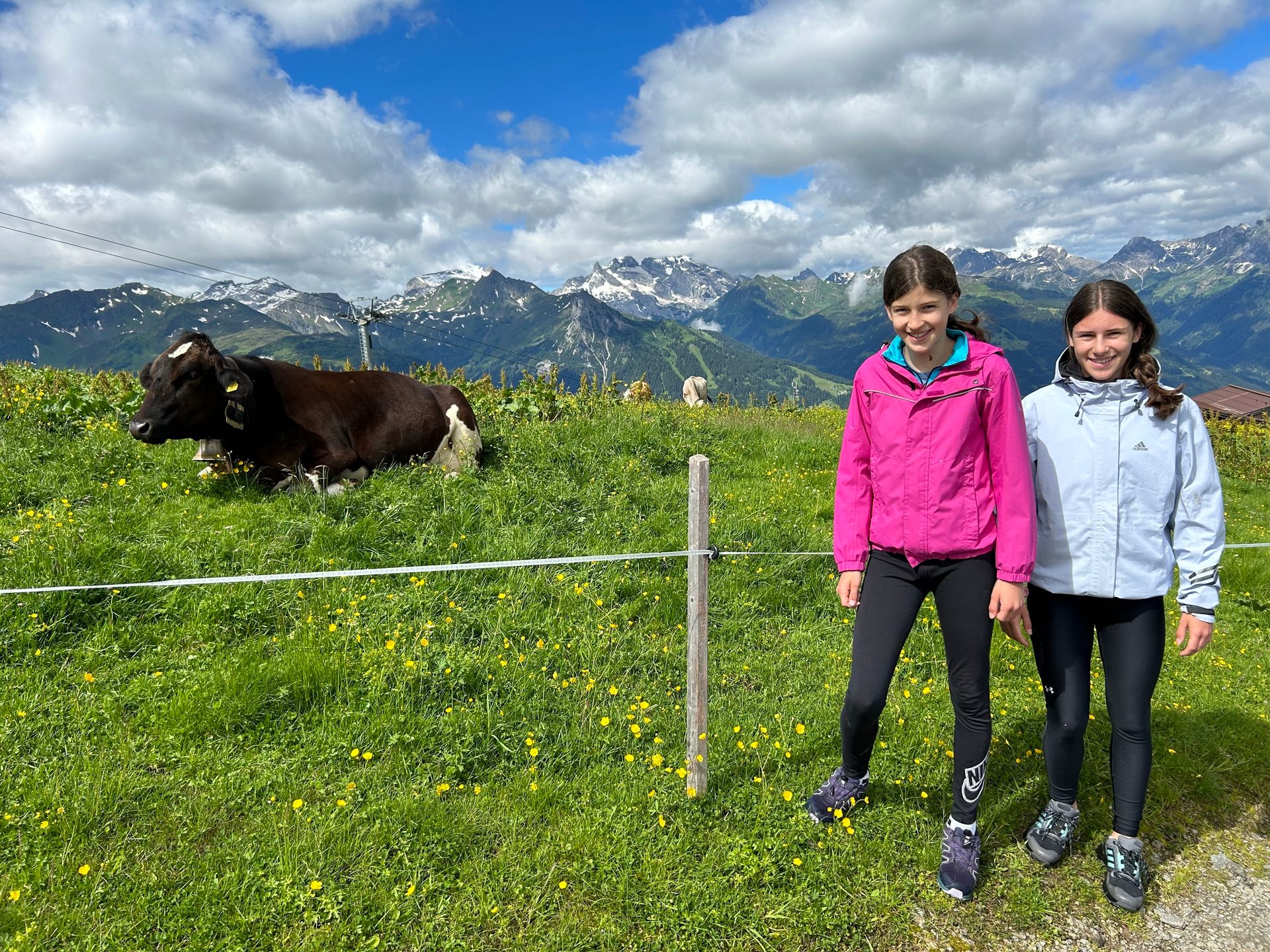 People in nature, Natural landscape, Sky, Cloud, Plant, Mountain, Ecoregion, Blue, Fence, Grass
