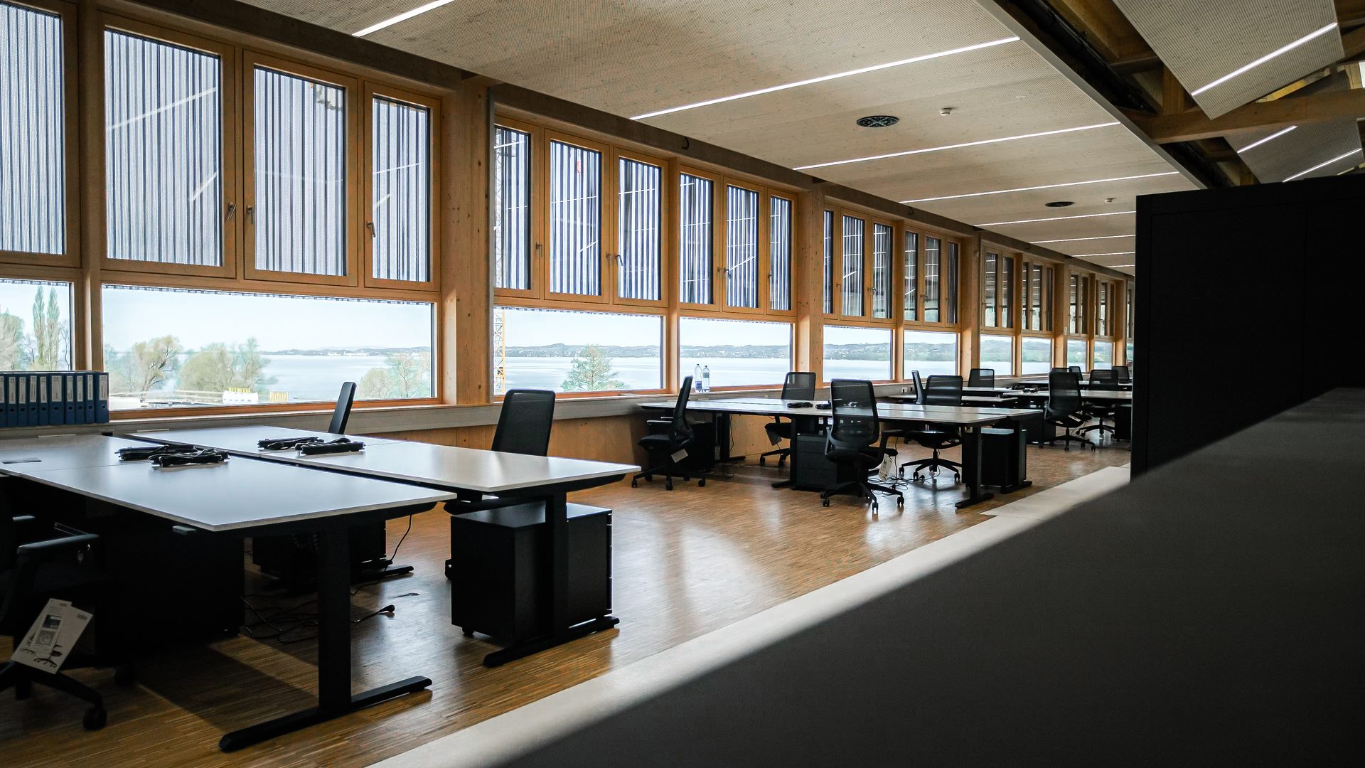 Interior design, Office chair, Wood, Flooring, Furniture, Floor, Ceiling, Desk, Glass