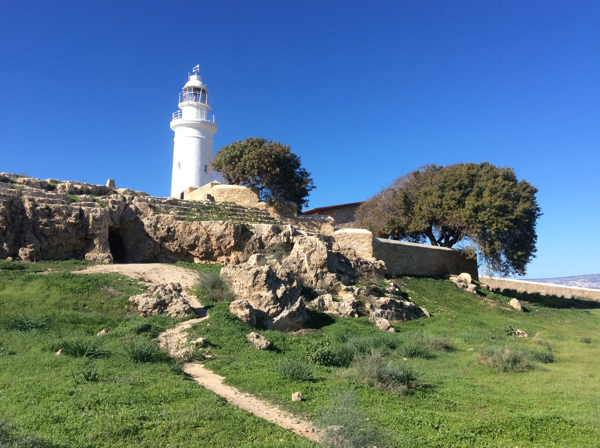 Natural landscape, Sky, Lighthouse, Plant, Nature, Azure, Tower, Tree, Biome, Beacon