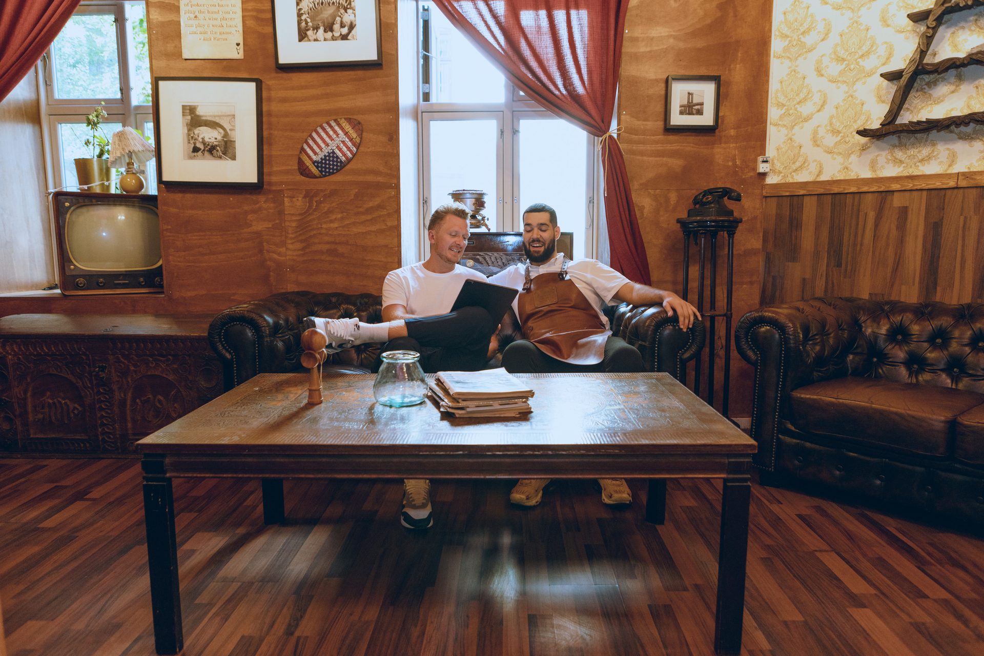 Picture frame, Interior design, Table, Furniture, Comfort, Wood, Building, Flooring, Couch, Lamp