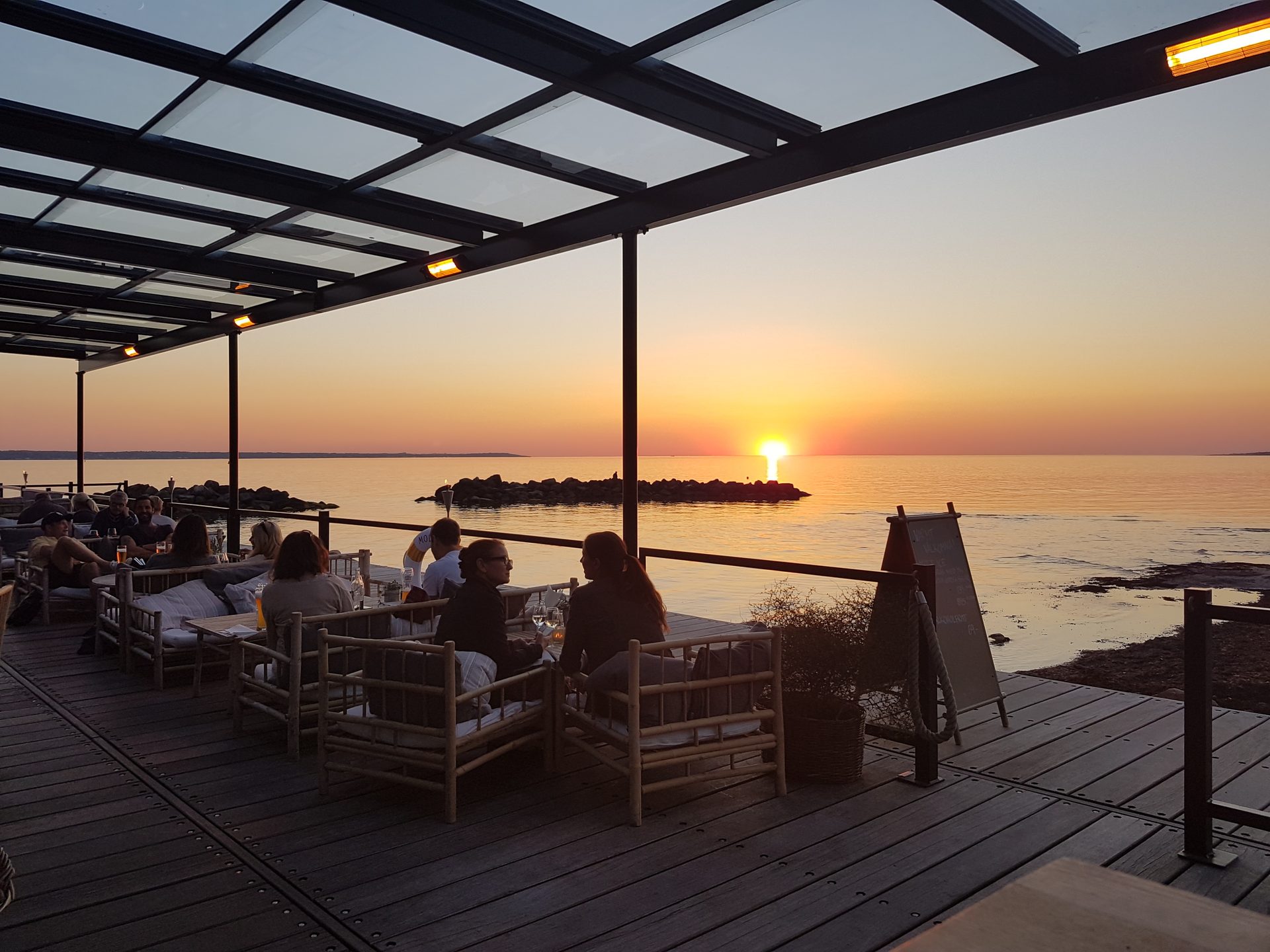 Body of water, Sky, Property, Afterglow, Shade, Dusk, Chair, Sunset, Sunlight