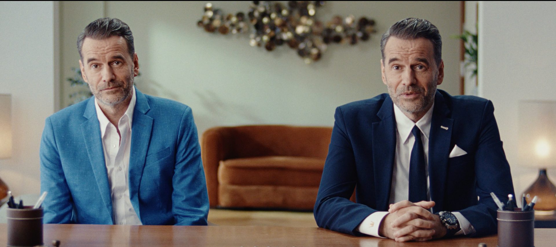 White-collar worker, Formal wear, Dress shirt, Furniture, Sitting, Blazer, Comfort, Suit