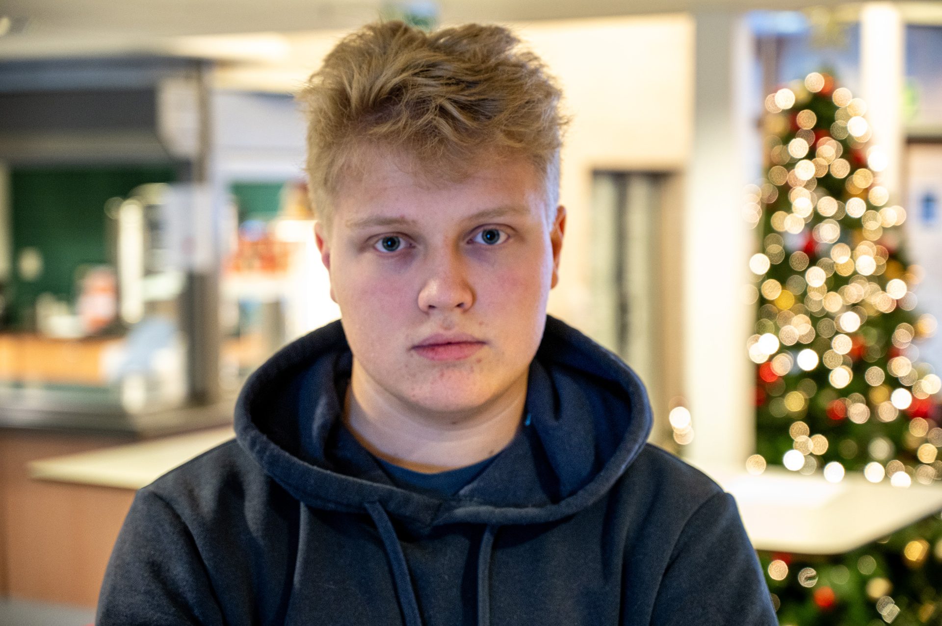 Facial expression, Chin, Cheek, Sleeve, Hood, Jacket