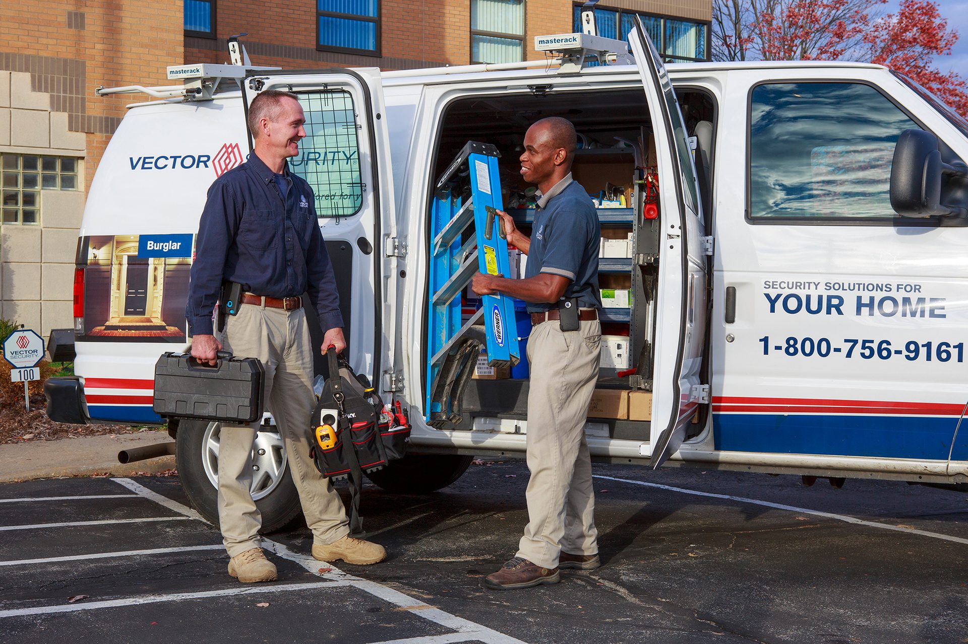 Mode of transport, Motor vehicle, Automotive exterior, Workwear, Window, Asphalt