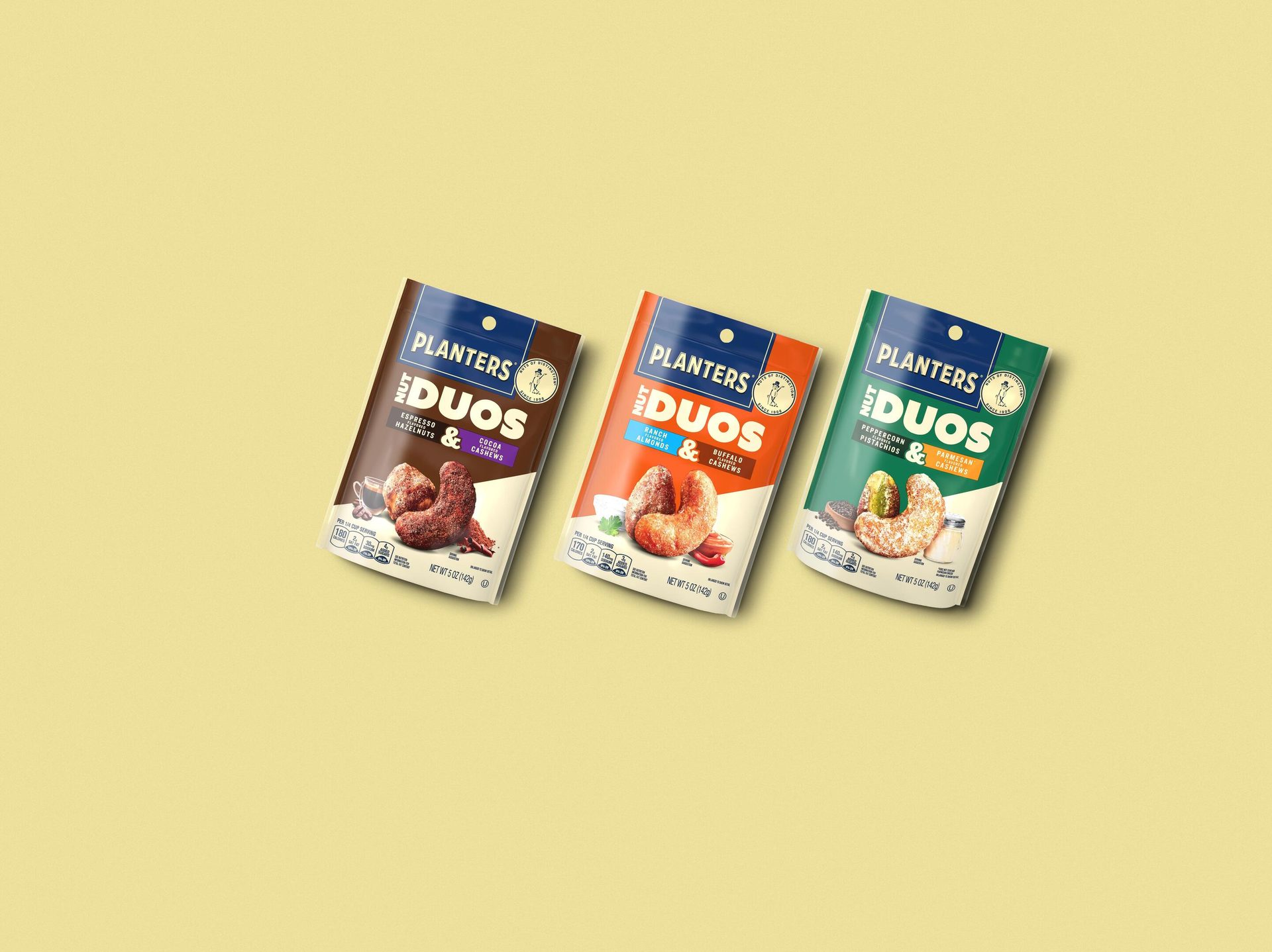 three pouches of Duos flavored nuts