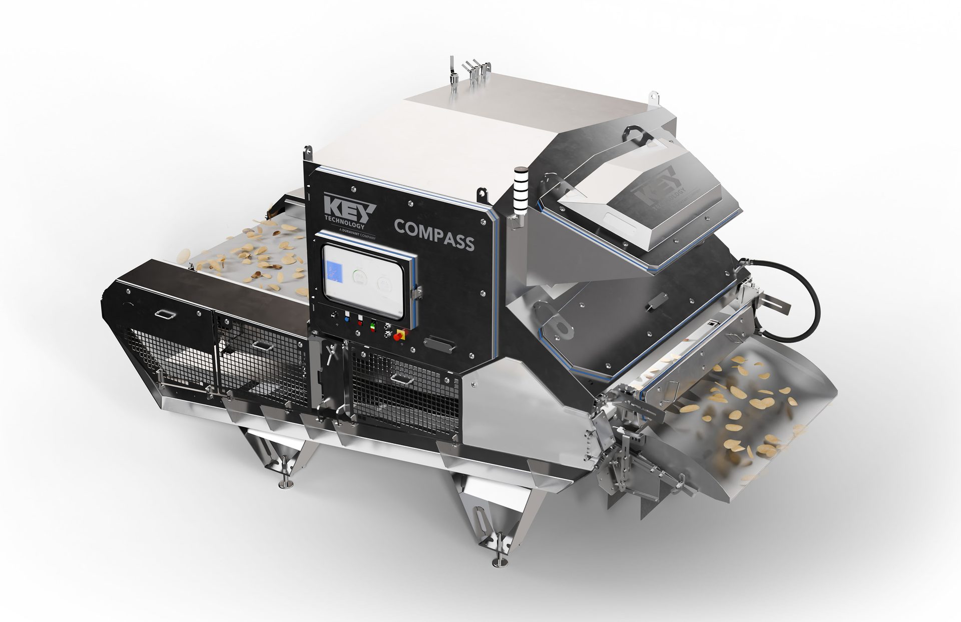 High-tech sorting machine, "KEY TECHNOLOGY COMPASS", processing food items on conveyor belts.