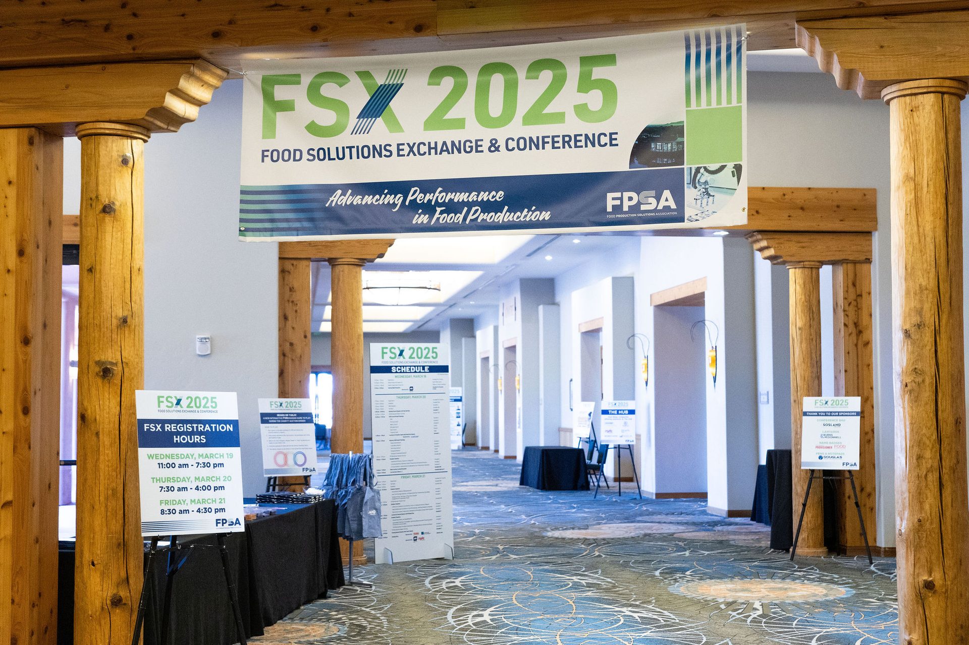 FSX 2025 Food Solutions Exchange & Conference banner and event signs inside a venue.