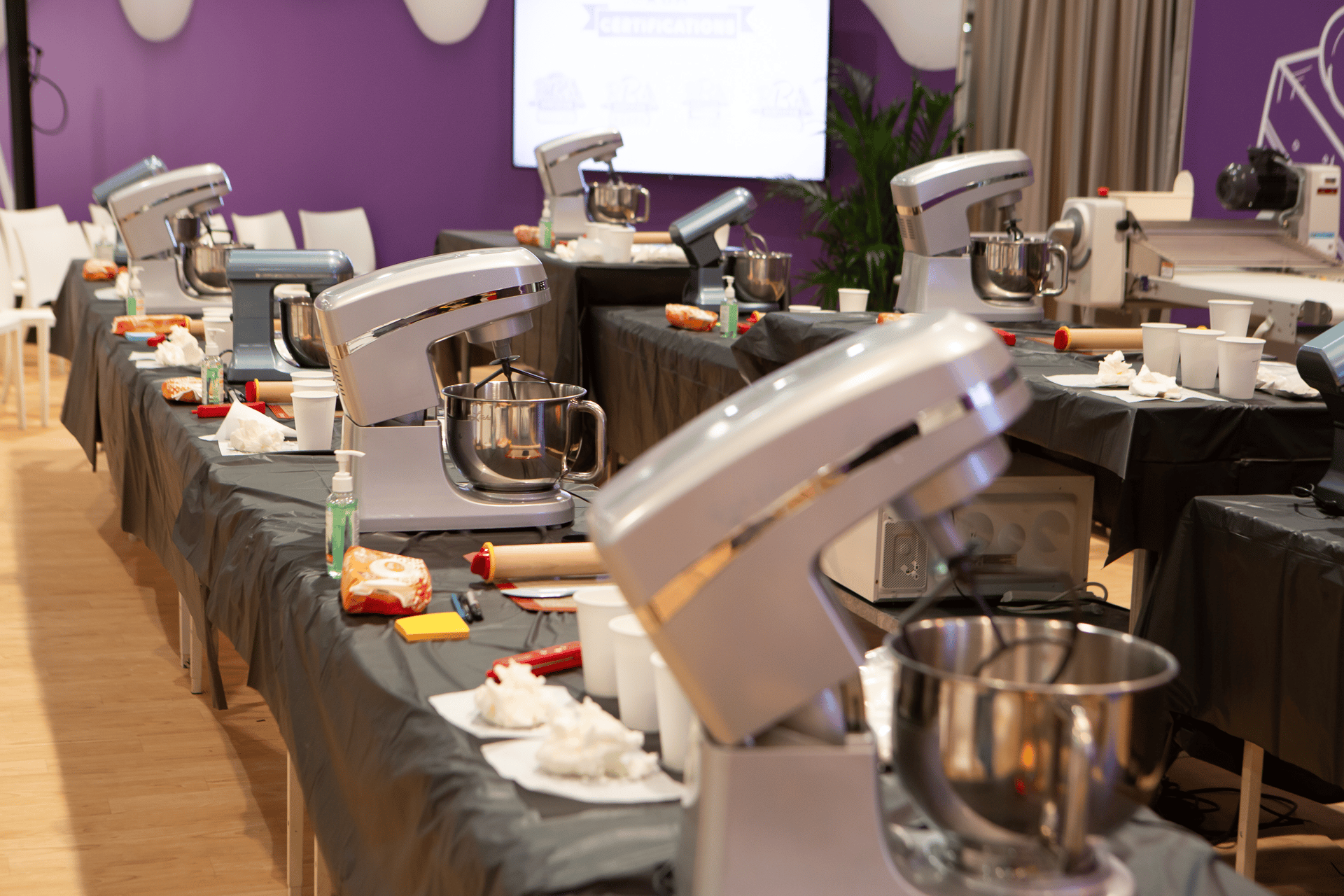 Several mixers in baking demo area