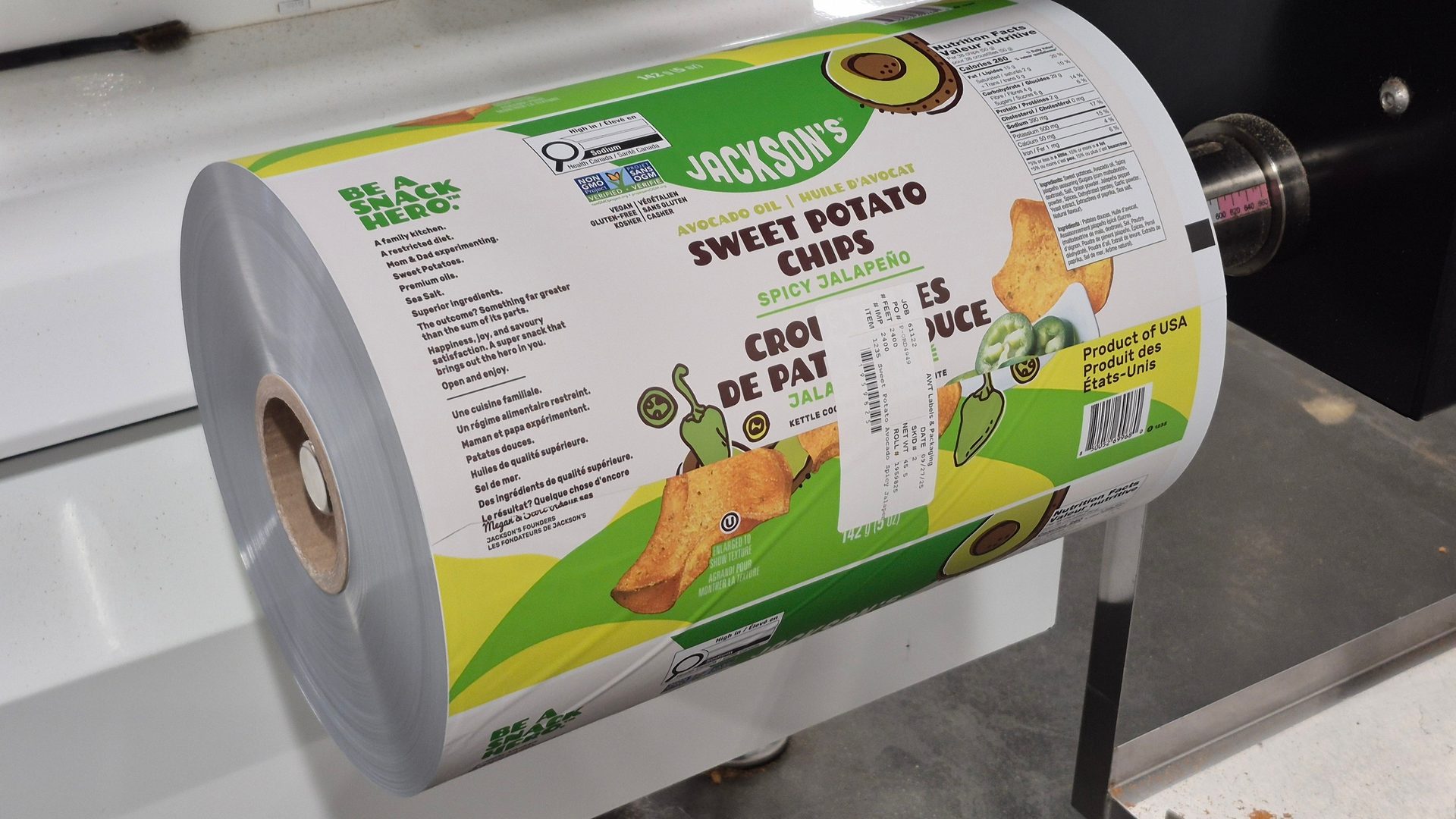 A roll of Jackson's Sweet Potato Chips Spicy Jalapeño packaging, showing product details, ingredients, and graphics.