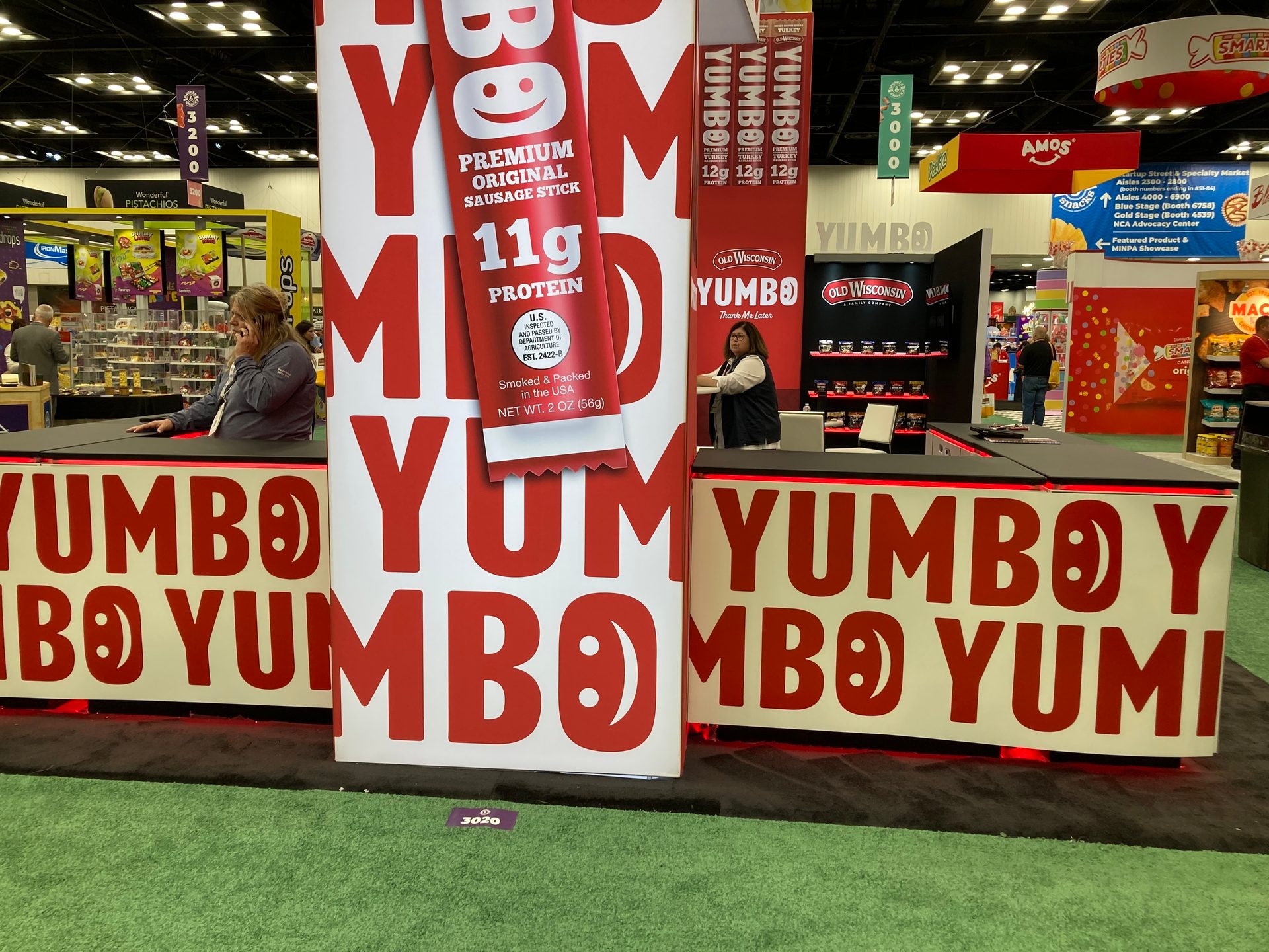 The Old Wisconsin booth at the 2025 Sweets & Snacks Expo, featuring sausage sticks with 11 grams of protein