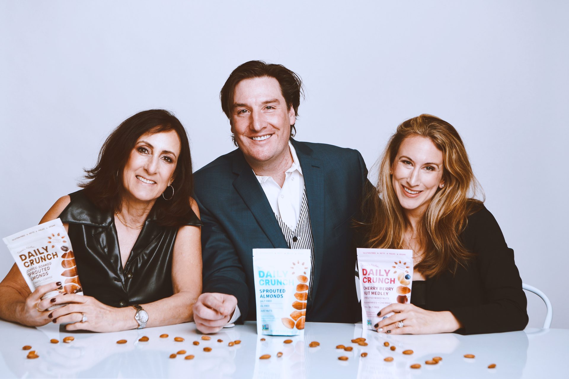 Group photo, Countertop, Products, Almonds, 3 people, Smiling