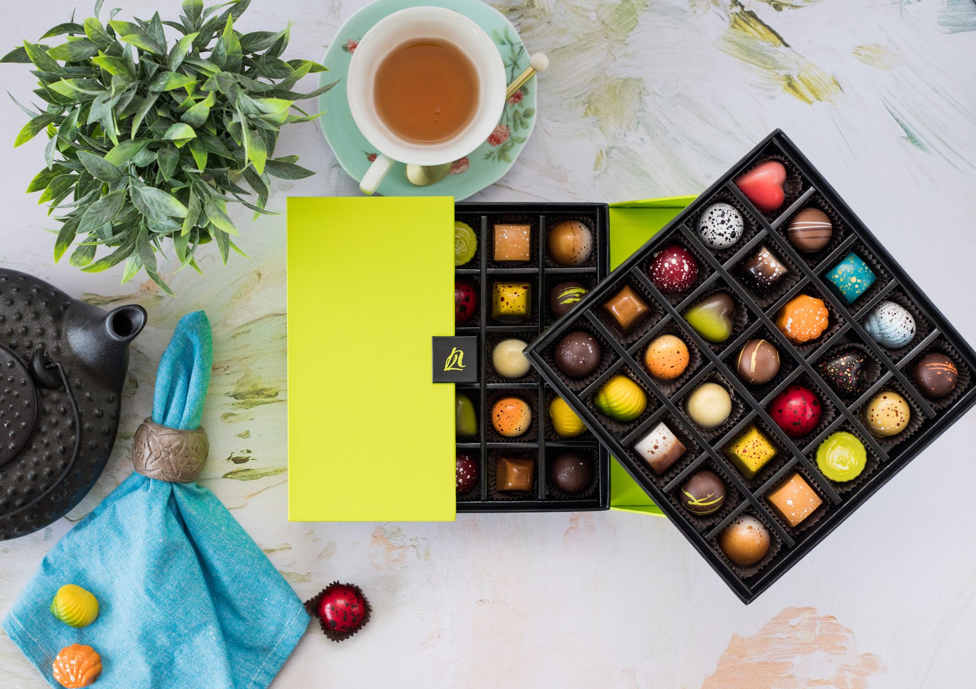 Tableware, Food, Box of chocolates, Napkin, Plant