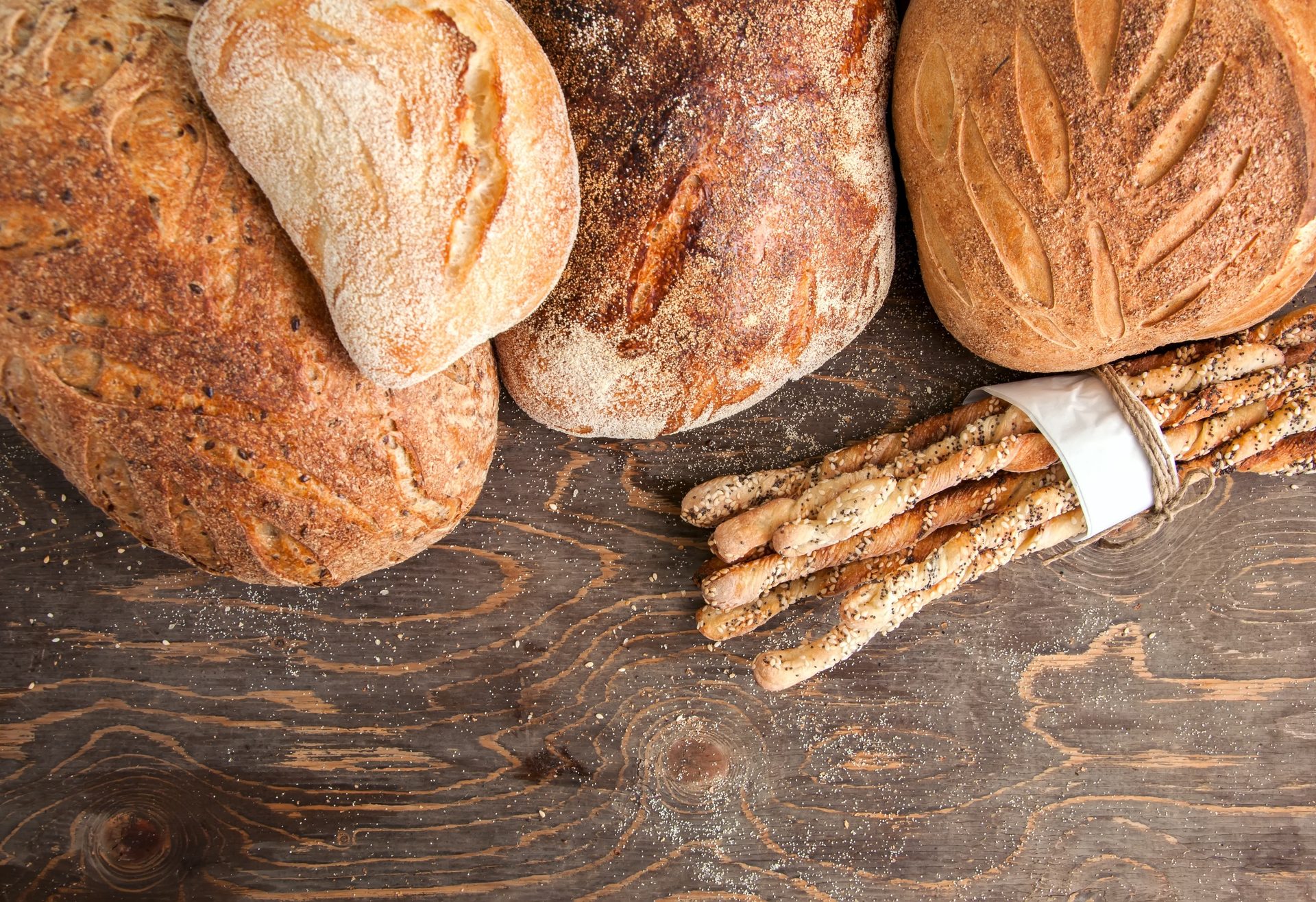 Staple food, Gesture, Wood, Ingredient, Breads
