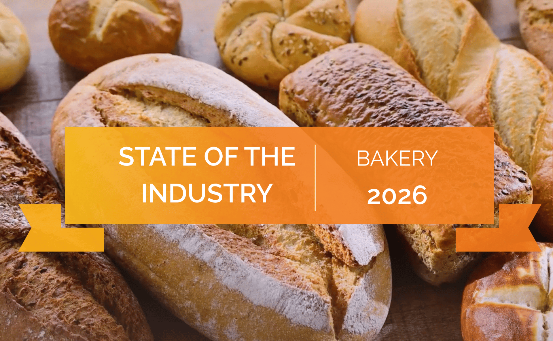 Freshly baked bread loaves with an orange banner overlay announcing 'State of the Bakery Industry 2026'.