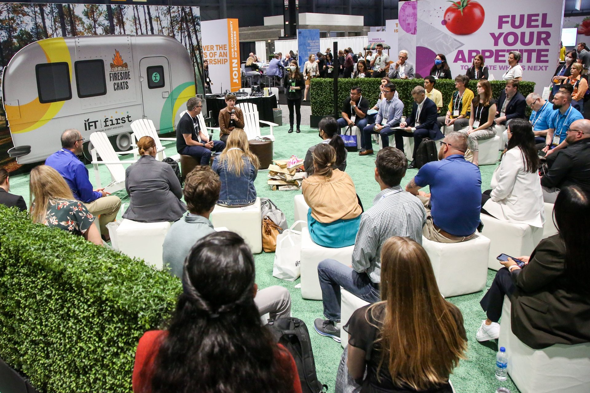 Social group, Expo booth, Public space, Plant, Green, Crowd, Chair, Leisure