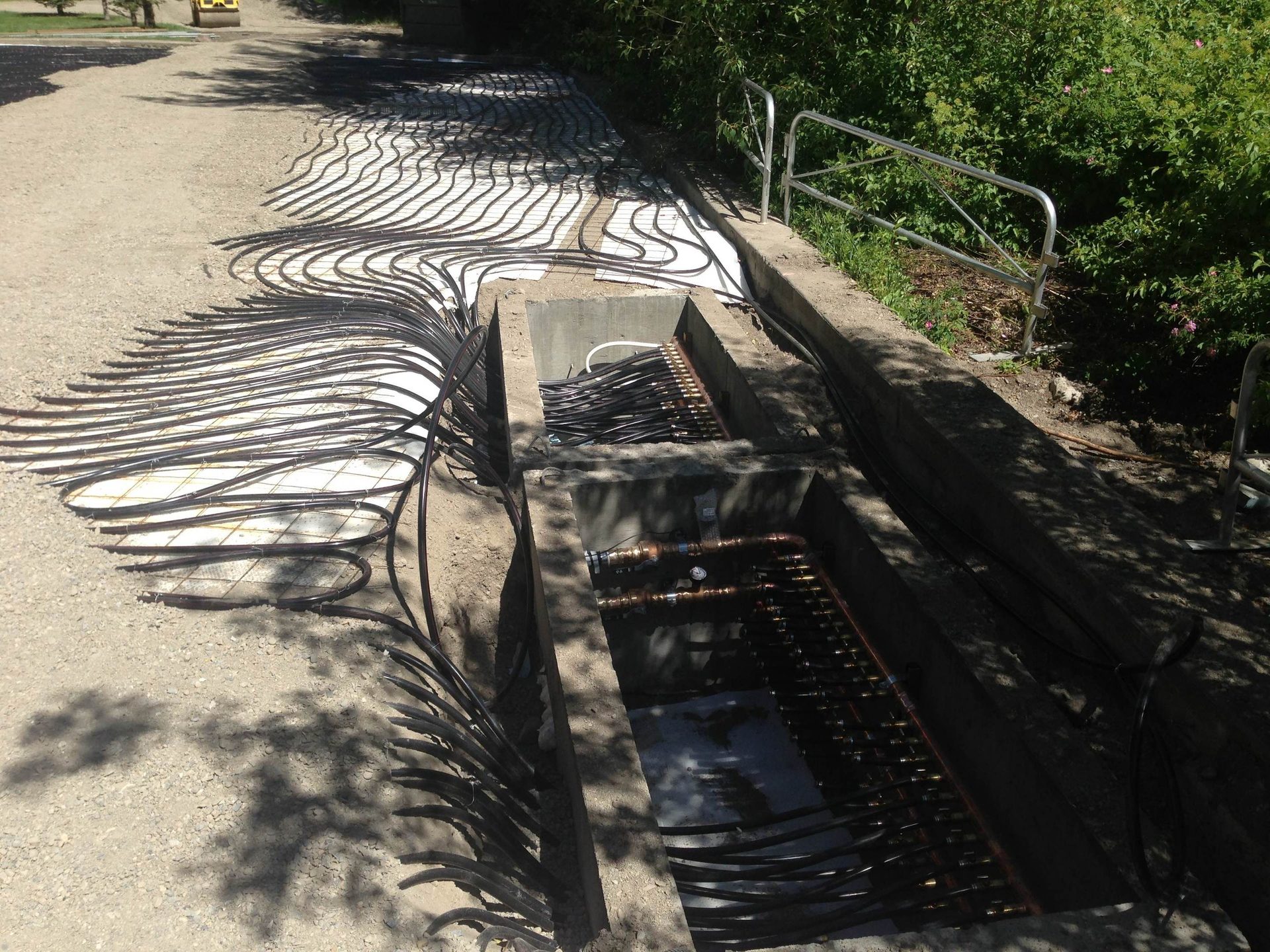 manifold vault, pavers, drainage
