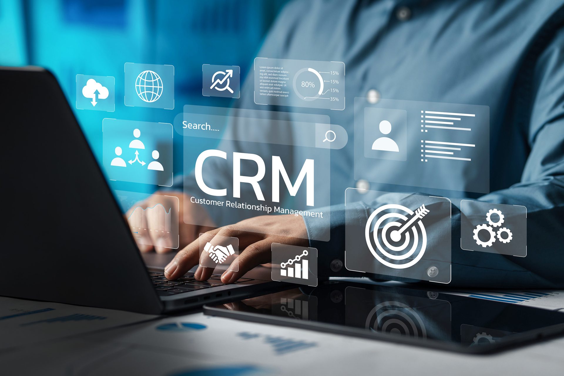 User interacts with a holographic CRM (Customer Relationship Management) interface on a laptop.