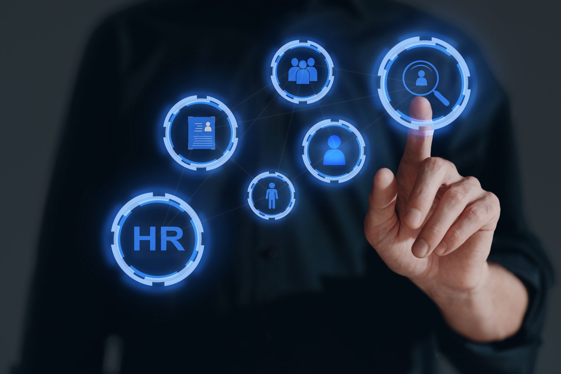 Hand interacting with holographic HR and recruitment icons, symbolizing human resources and talent search.